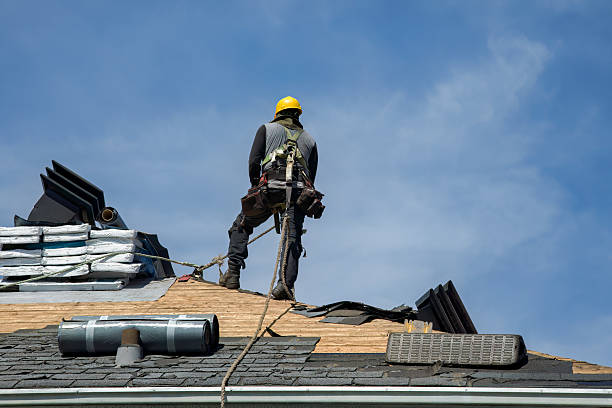 Professional Roof Replacement technician working in Bedminster, NJ
